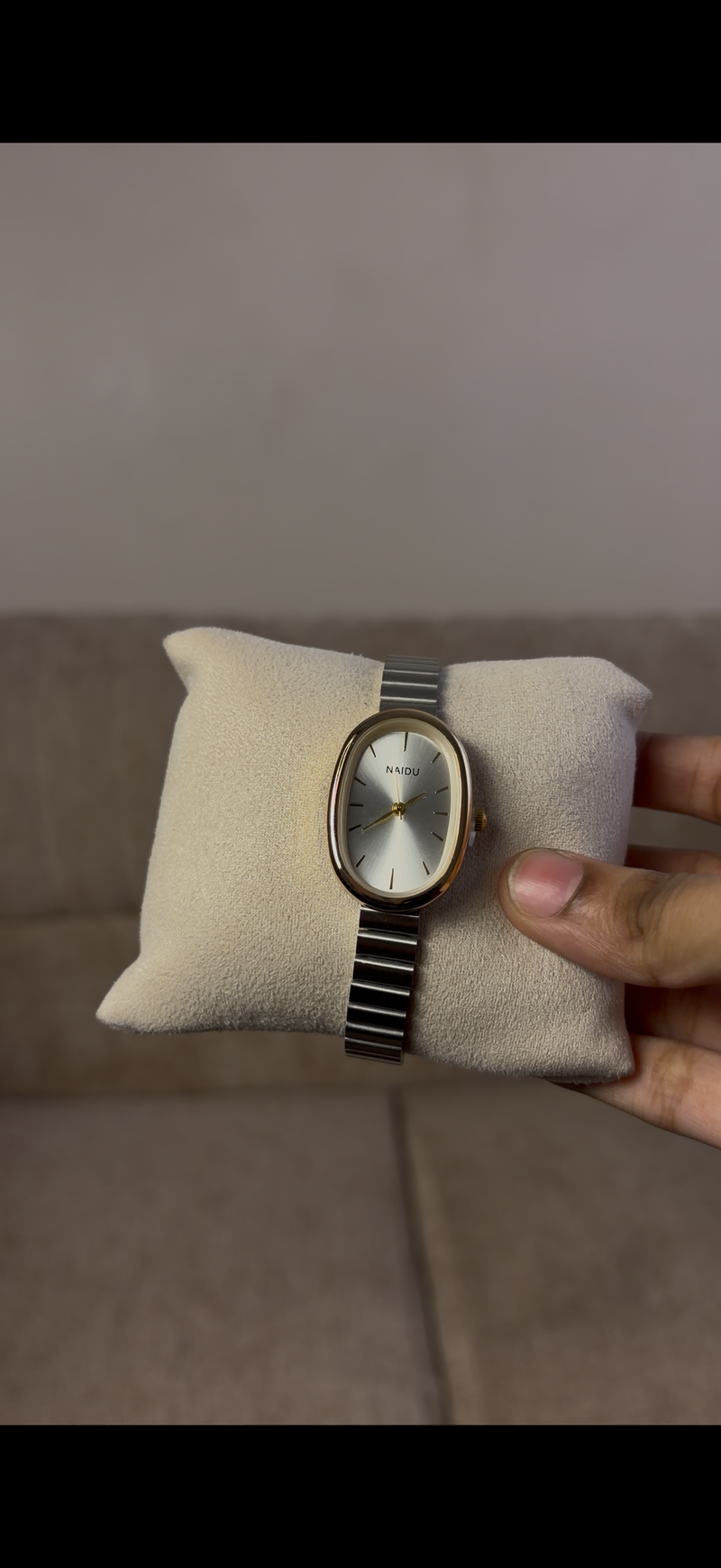 Naidu oval gold border silver strap