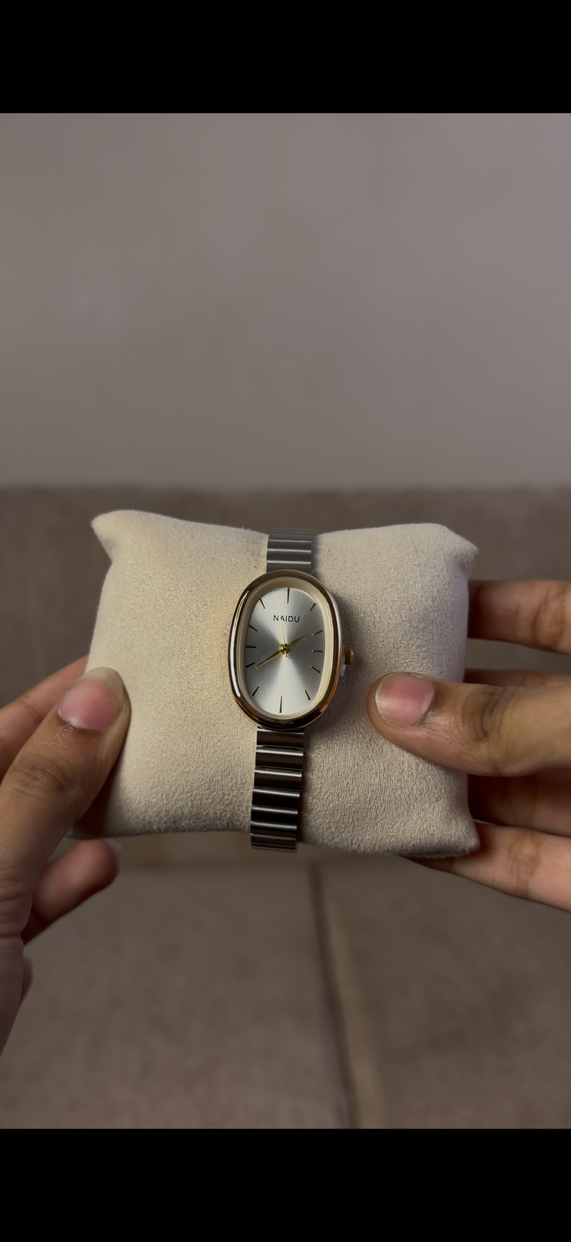 Naidu oval gold border silver strap